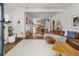 Open-concept living room seamlessly connects to the dining area, offering a spacious and inviting atmosphere at 2412 W Prospect Rd, Tampa, FL 33629