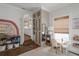 Charming playroom with built-in storage, a small table, and a view to a kitchen at 2412 W Prospect Rd, Tampa, FL 33629