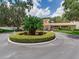Beautiful community clubhouse with manicured landscaping, providing a welcoming and upscale environment at 24811 Gun Smoke Dr, Land O Lakes, FL 34639