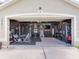 Garage transformed into a home gym with professional equipment and ample space for workouts at 24811 Gun Smoke Dr, Land O Lakes, FL 34639