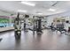 Well-equipped gym with modern machines and free weights, perfect for maintaining an active lifestyle at 24811 Gun Smoke Dr, Land O Lakes, FL 34639