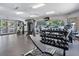 Bright community gym with modern equipment, plenty of natural light, and various fitness options at 24811 Gun Smoke Dr, Land O Lakes, FL 34639