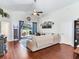 Comfortable living room with sliding glass doors that lead to an outdoor patio at 24811 Gun Smoke Dr, Land O Lakes, FL 34639