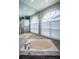 Bathroom features an oversized soaking tub and natural light from large windows at 2691 Saddlewood Ln, Palm Harbor, FL 34685
