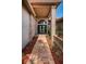 Charming entryway with brick walkway leading to the front door of this property at 2691 Saddlewood Ln, Palm Harbor, FL 34685