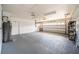 Spacious garage with high ceilings and ample storage space at 2691 Saddlewood Ln, Palm Harbor, FL 34685