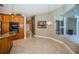 Kitchen with built in oven and bar seating at 2691 Saddlewood Ln, Palm Harbor, FL 34685
