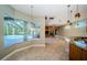 Kitchen area offering views of the screened in pool at 2691 Saddlewood Ln, Palm Harbor, FL 34685