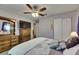 Bedroom featuring neutral walls, a dresser, and a comfortable queen-sized bed at 2914 Forest Cir, Seffner, FL 33584