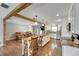 Open-concept kitchen with breakfast bar and stainless steel appliances, and view into living room at 2914 Forest Cir, Seffner, FL 33584