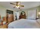 Main bedroom features wood floors and ensuite bathroom at 2914 Forest Cir, Seffner, FL 33584