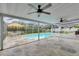 Screened-in pool area featuring a paved patio and clear view of the backyard at 2914 Forest Cir, Seffner, FL 33584