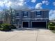 Charming two-story home featuring a well-maintained yard and a convenient two-car garage at 33191 Azalea Ridge Dr, Wesley Chapel, FL 33545