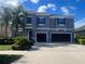 Charming two-story home featuring a well-maintained yard and a convenient two-car garage at 33191 Azalea Ridge Dr, Wesley Chapel, FL 33545