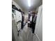 Spacious walk-in closet with custom shelving, drawers, and ample hanging space for clothes, shoes, and accessories at 33191 Azalea Ridge Dr, Wesley Chapel, FL 33545