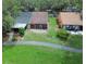 Charming single-Gathering homes with well-maintained lawns and mature trees provide a serene living environment at 35077 Whispering Oaks Blvd, Dade City, FL 33523