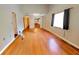 Spacious living room with hardwood flooring and ample natural light at 35077 Whispering Oaks Blvd, Dade City, FL 33523