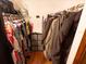 Spacious walk-in closet with organized clothing racks and ample storage shelving at 35077 Whispering Oaks Blvd, Dade City, FL 33523