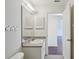 Bathroom with a sink and open doorway at 38237 Eucalyptus Dr, Zephyrhills, FL 33542