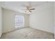 Bedroom with natural lighting and neutral carpet at 38237 Eucalyptus Dr, Zephyrhills, FL 33542