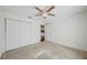 Bedroom with carpet and ceiling fan at 38237 Eucalyptus Dr, Zephyrhills, FL 33542