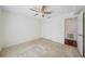 Bedroom featuring a ceiling fan and closet at 38237 Eucalyptus Dr, Zephyrhills, FL 33542