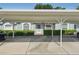 Exterior view of the home and parking structure with the property number clearly displayed at 38237 Eucalyptus Dr, Zephyrhills, FL 33542