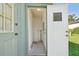 Outdoor storage room with white walls and a small window on the access door at 38237 Eucalyptus Dr, Zephyrhills, FL 33542