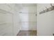 Walk-in closet featuring ample shelving and storage options at 38237 Eucalyptus Dr, Zephyrhills, FL 33542