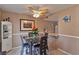 Inviting dining area features a glass table, modern chairs, and stylish decor at 4215 E Bay Dr # 1706A, Clearwater, FL 33764