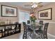 Cozy dining area with modern furnishings, tile floors, and a large window offering natural light at 4215 E Bay Dr # 1706A, Clearwater, FL 33764