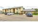 Inviting two-story condo with a well-maintained exterior and ample parking spaces for residents and visitors at 4215 E Bay Dr # 1706A, Clearwater, FL 33764