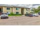 Well-maintained condo building with convenient parking and lush landscaping, creating a welcoming atmosphere at 4215 E Bay Dr # 1706A, Clearwater, FL 33764