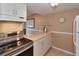 Well-lit kitchen featuring modern stainless steel appliances, ample counter space at 4215 E Bay Dr # 1706A, Clearwater, FL 33764