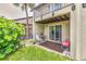 Charming outdoor patio space, perfect for relaxing or entertaining, with a view of the lush green surroundings at 4215 E Bay Dr # 1706A, Clearwater, FL 33764