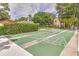 Well-maintained shuffleboard courts with lush landscaping, offering a relaxing recreational space at 4215 E Bay Dr # 1706A, Clearwater, FL 33764
