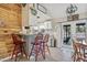 Cozy dining space adjacent to the kitchen with rustic decor and natural light at 4613 Summerwind Ct, Plant City, FL 33566