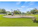 A playground with slide and swings in green park at 4613 Summerwind Ct, Plant City, FL 33566