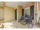 Welcoming front porch featuring cozy seating, ideal for enjoying morning coffee or evening chats at 4613 Summerwind Ct, Plant City, FL 33566
