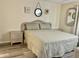 Serene bedroom with wicker accents and beach-inspired decorations at 4712 Marine Pkwy # 203, New Port Richey, FL 34652