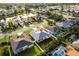 Lovely home with mature landscaping, a white picket fence, and a screened-in porch, located in a quiet neighborhood at 5017 46Th W St, Bradenton, FL 34210