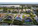 A birds eye view of a home with a nearby pond and an expansive residential area at 5017 46Th W St, Bradenton, FL 34210