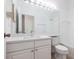 Well-lit bathroom features dual vanity sinks, and a shower-tub combo at 5017 46Th W St, Bradenton, FL 34210
