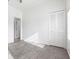 The light bedroom with a large closet has tiled floors at 5017 46Th W St, Bradenton, FL 34210