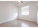 Bedroom features a window, tile floor, closet and ceiling fan at 5017 46Th W St, Bradenton, FL 34210