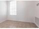Bright bedroom with tile flooring and natural light at 5017 46Th W St, Bradenton, FL 34210