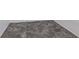 Close-up of tile flooring, laid out in a diamond pattern, featuring a clean-edged baseboard at 5017 46Th W St, Bradenton, FL 34210
