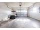 Spacious garage interior featuring a golf cart and ample room for storage and vehicles at 5017 46Th W St, Bradenton, FL 34210