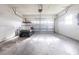 Clean and bright garage featuring a golf cart and an automatic door, offering convenience and practicality at 5017 46Th W St, Bradenton, FL 34210