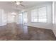 Bright living room features tile flooring and a sliding glass door that lets in plenty of natural light at 5017 46Th W St, Bradenton, FL 34210